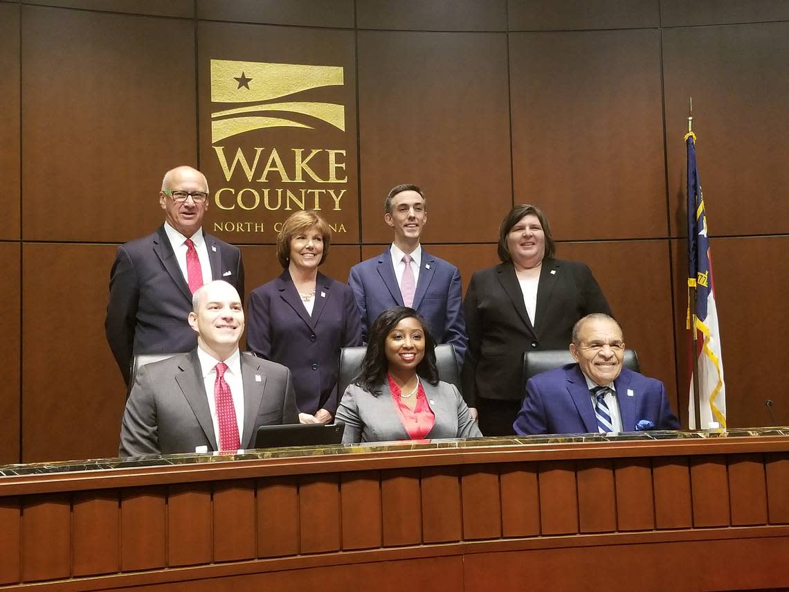 The Wake County Board of Commissioners sworn in on Dec. 3, 2018. Back, from left to right, Sig Hutchinson, Susan Evans, Matt Calabria and Vickie Adamson. Front, from left to right, Greg Ford, Jessica Holmes and James West.