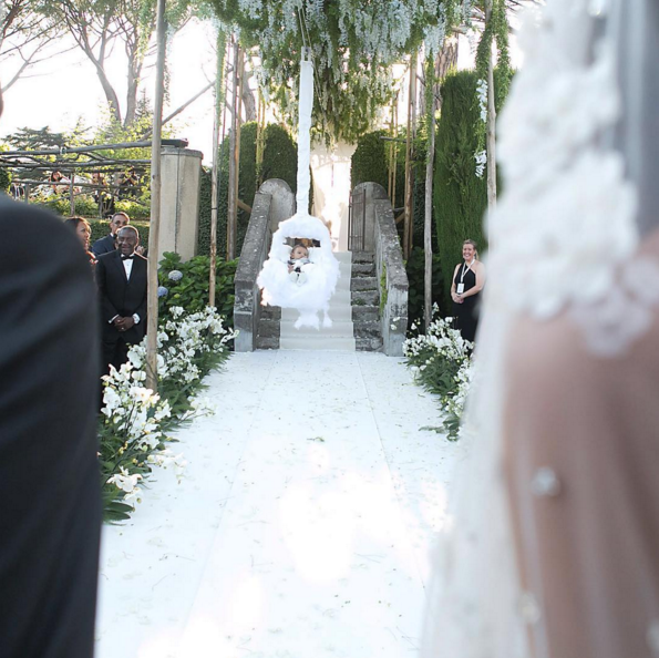 The couple’s son, Hendrix, floated down the aisle in a cloud contraption assembled by Cirque du Soleil’s production team. 