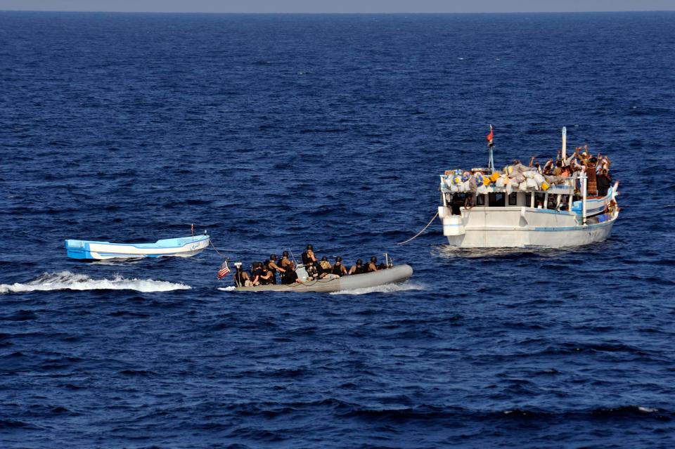 Sailors assigned to a visit, board, search and seizure (VBSS) team from the guided-missile destroyer USS Jason Dunham (DDG 109) investigate a Yemeni-flagged dhow.