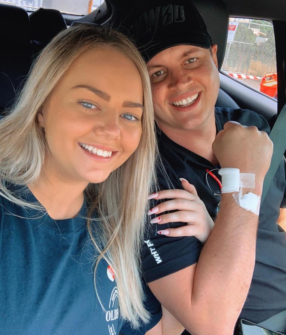 Johnny Ruffo and Tahnee Sims take a selfie from a car