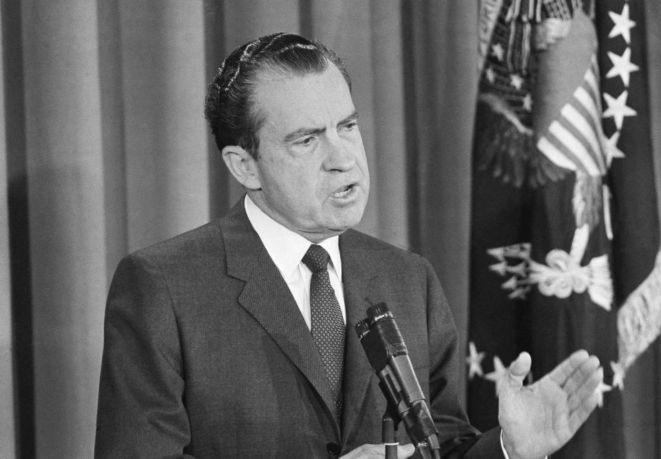 FILE - In this Jan. 27, 1963, file photo President Richard Nixon speaks during first news conference as president in the East Room of the White House in Washington. (AP Photo, File)