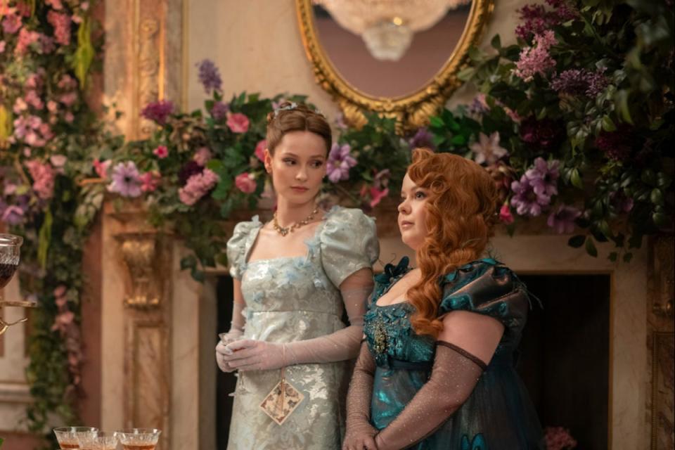 Women in Bridgerton wear long gowns with short balloon sleeves and long gloves (LIAM DANIEL/NETFLIX)