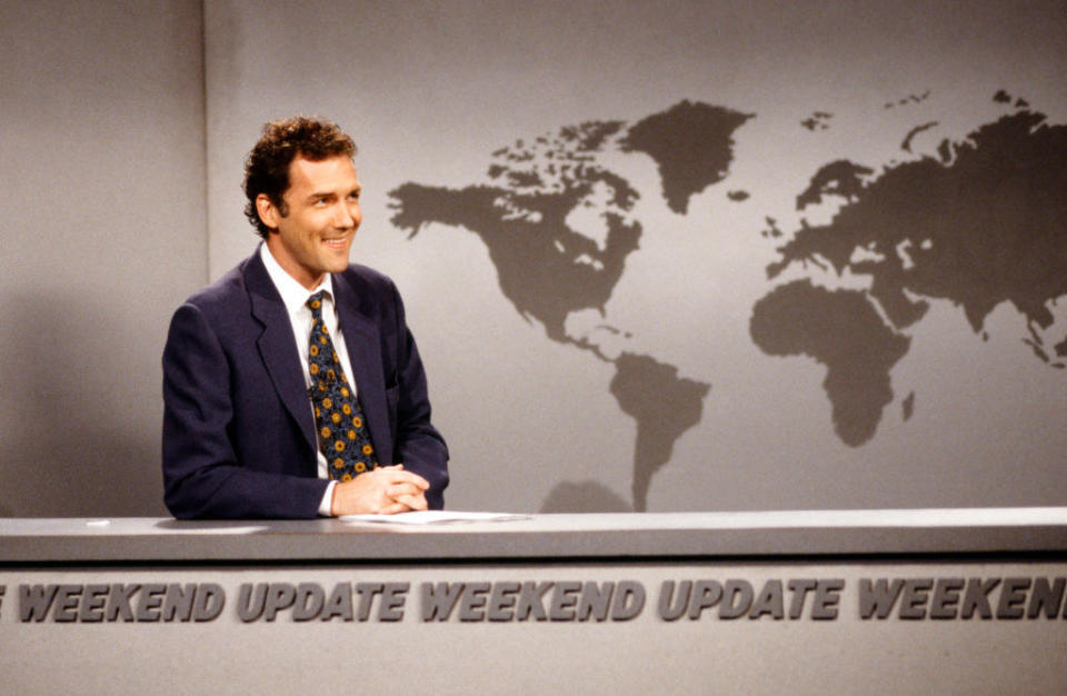 Norm McDonald on the set of "Weekend Update"