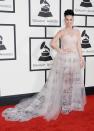 <p>Katy looked effortlessly elegant in this nude tulle floor-length dress with quirky music note detail. [Photo: Getty] </p>