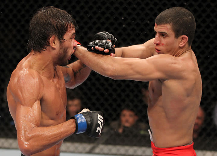 BELO HORIZONTE, BRAZIL - JUNE 23: (R-L) Felipe Arantes and Milton Vieira exchange punches during their UFC 147 featherweight bout at Estadio Jornalista Felipe Drummond on June 23, 2012 in Belo Horizonte, Brazil.