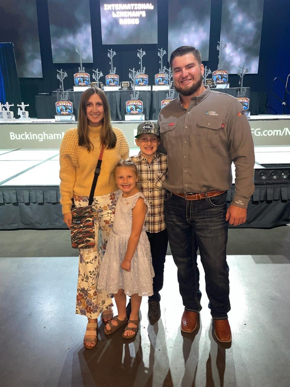 Daniel Nash, his wife Destiny, and their children Aidan and Kamdan pose Oct. 14 from the International Lineman's Rodeo in Bonner Springs, Kansas.