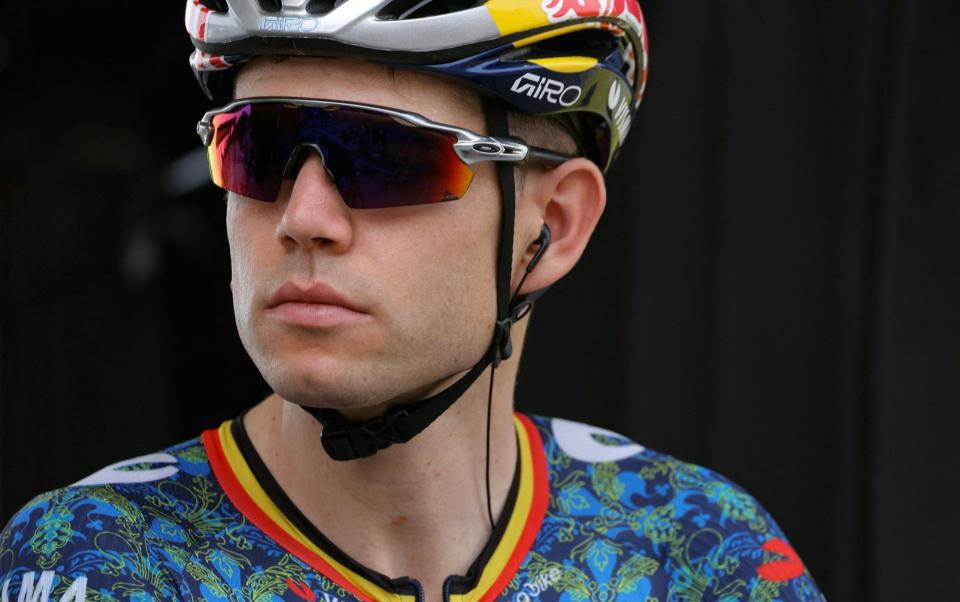 Wout van Aert looks on before the start of stage three