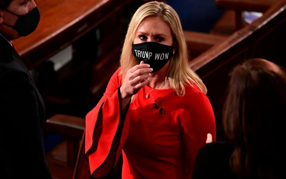 Republican Marjorie Taylor Greene wearing a "Trump Won" face mask on January 3 - Erin Scott /Pool Reuters 