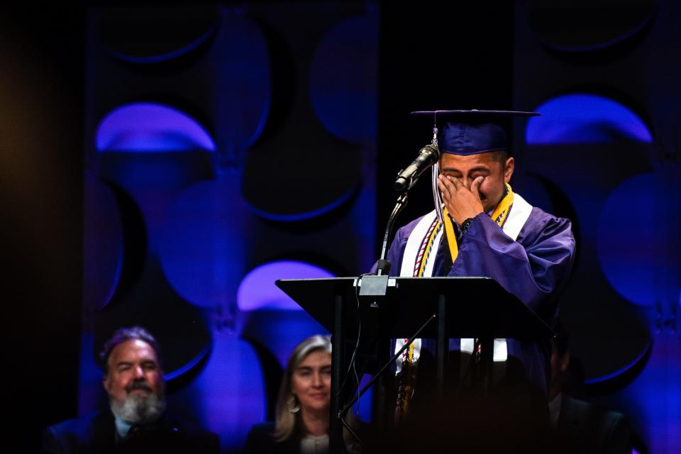 Holt Valedictorian Humberto Angel Lopez-Garcia wipes away tears during his speech at the 2022 Holt High School graduation at Church of the Highlands Tuscaloosa Campus, Thursday May 19, 2022. [Photo/Will McLelland] 