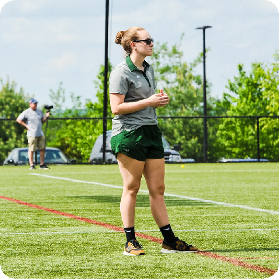 passaro coaching the girl's varsity lacrosse team at the high school where she teaches