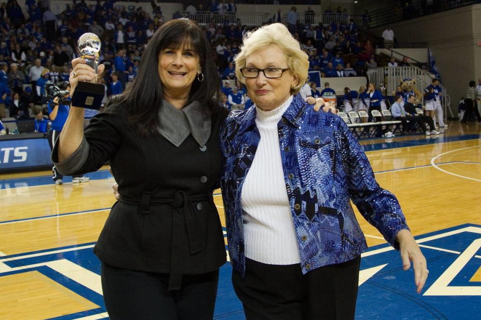 Former UK women’s head coach and athletic director Sue Feamster, right, walks off the court with 2013 Sue Feamster Trailblazer award recipient Leah Little who was UK’s gymnastics coach from 1981-2001. Feamster launched the Wildcats’ women’s basketball program and moved it from club to varsity status.