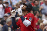 Minnesota Twins' Byron Buxton reacts after hitting a home run during the fifth inning of a baseball game against the Cleveland Guardians, Sunday, May 15, 2022, in Minneapolis. (AP Photo/Stacy Bengs)