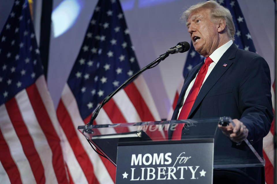 FILE - Republican presidential candidate former President Donald Trump speaks at the Moms for Liberty meeting in Philadelphia, June 30, 2023. The conservative parental rights group Moms for Liberty plans to spend more than $3 million on a multi-state advertising blitz to increase its membership and engage voters before November. (AP Photo/Matt Rourke, File)