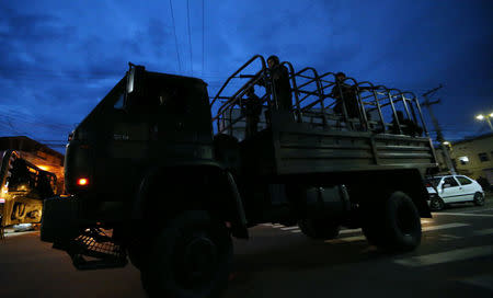 Army soldiers patrol the streets of Vila Velha, Espirito Santo, Brazil February 9, 2017. REUTERS/Paulo Whitaker