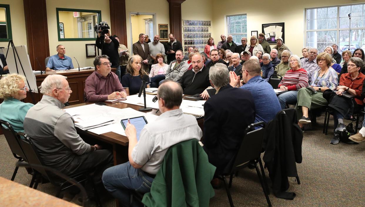 Members of New Franklin Planning & Zoning Commission meet with a representative of the Water 9 developer Wednesday at New Franklin City Hall.