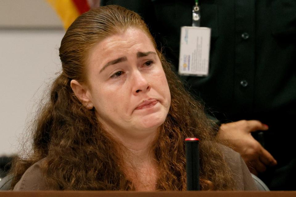 Danielle Woodard testifies in court at her biological brother’s trial (VIA REUTERS)