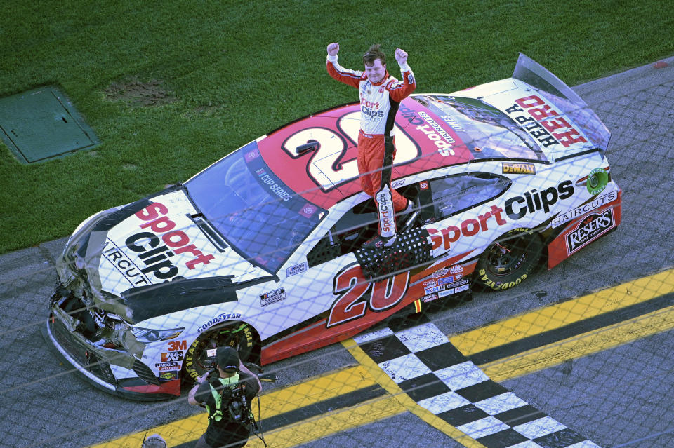 Erik Jones (20) celebrates after winning the NASCAR Daytona Clash auto race at Daytona International Speedway Sunday, Feb. 9, 2020 in Daytona Beach, Fla. (AP Photo/Phelan M. Ebenhack)