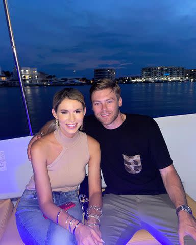 <p>Josh Rutledge Instagram</p> Laura Rutledge and Josh Rutledge pose for a photo on a boat