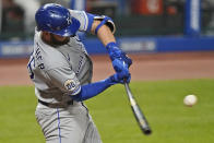 Kansas City Royals' Cam Gallagher hits an RBI double during the seventh inning of the team's baseball game against the Cleveland Indians, Tuesday, Sept. 8, 2020, in Cleveland. (AP Photo/Tony Dejak)