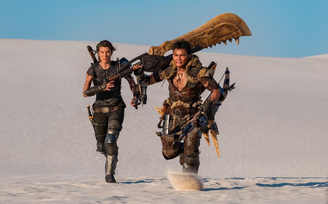 Milla Jovovich and Tony Jaa sprint into another lurid battle in Monster Hunter - Coco Van Oppens 