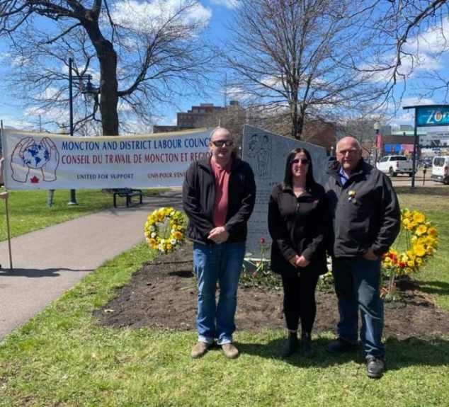 (Left to right) Bryan Harris, vice president of the Moncton & District Labour Council, Melissa Brown, president of the Moncton & District Labour Council, and Daniel Légère, president of New Brunswick Federation of Labour, at the national day of mourning ceremony 2023. 