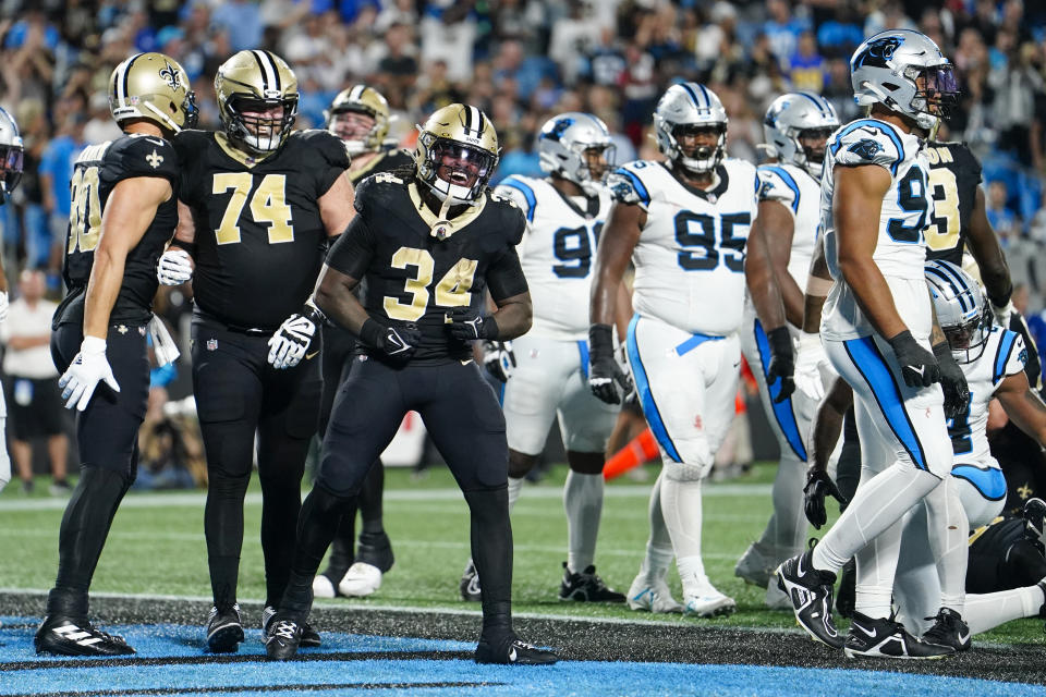 New Orleans Saints running back Tony Jones Jr. celebrates after scoring against the Carolina Panthers during the second half of an NFL football game Monday, Sept. 18, 2023, in Charlotte, N.C. (AP Photo/Jacob Kupferman)