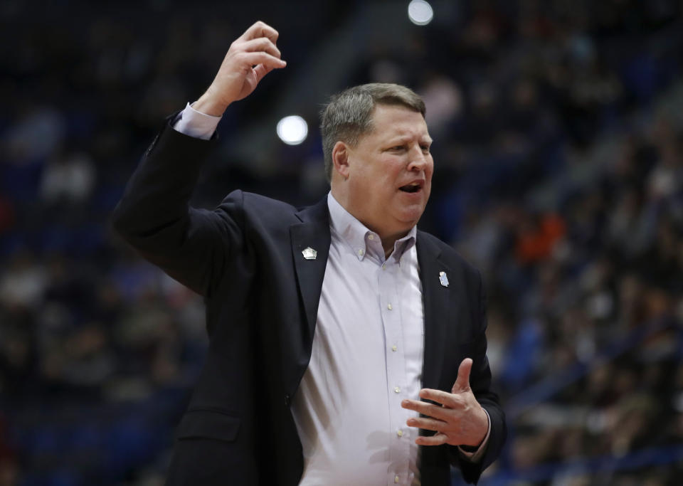 Old Dominion head coach Jeff Jones reacts on the bench during the first half of a first round men's college basketball game against Purdue in the NCAA Tournament, Thursday, March 21, 2019, in Hartford, Conn. (AP Photo/Elise Amendola)