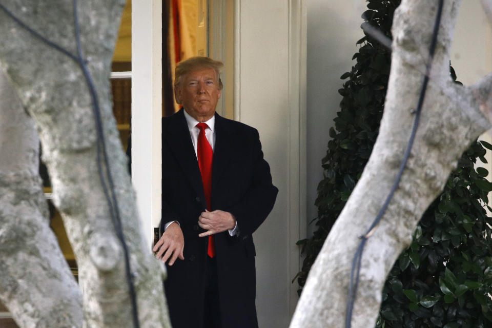 President Donald Trump walks out of the Oval Office to speak to members of the media on the South Lawn of the White House in Washington. (Photo: ASSOCIATED PRESS)