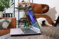 <p>Samsung Galaxy Book Pro 360 review pictures. Side view of the Galaxy Book Pro 360 sitting on a desk with its screen slightly tilted inwards.</p> 