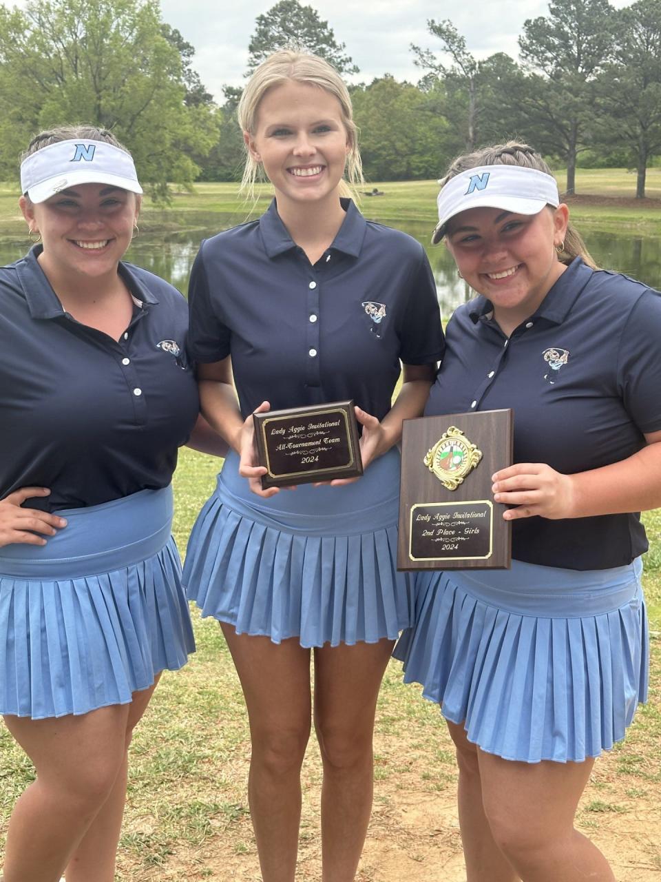 Anna Perdue (left), Lucy Lunceford (middle) and Allie Perdue (right) of the Northside High School girls golf team following their second-place finish in the Aggie Invitational Tournament at Sylacauga Country Club.