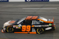 Travis Pastrana (99) drives during the NASCAR Nationwide Series auto race at Richmond International Raceway, Friday, April 27, 2012, in Richmond, Va. (AP Photo/LAT, Lesley Ann Miller)