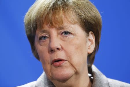 German Chancellor Angela Merkel speaks to media after her meeting with Turkish Prime Minister Ahmet Davutoglu at the Chancellery in Berlin, January 12, 2015. REUTERS/Hannibal Hanschke