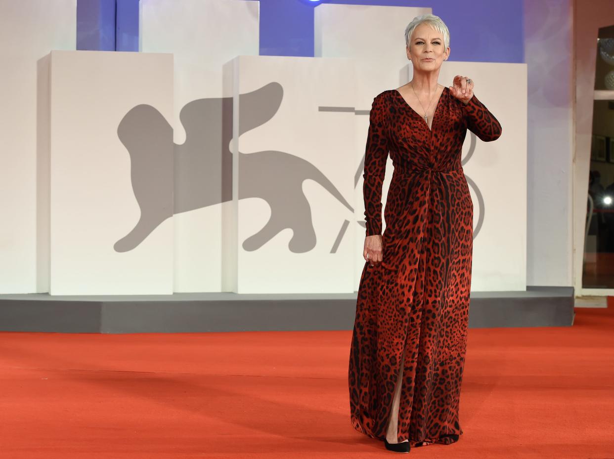 Jamie Lee Curtis wears a red dress while attending the 78th Venice International Film Festival September 2021.