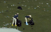 <p>Agents from the FBI continue to process evidence at the scene of a mass shooting on Wednesday, Oct. 4, 2017, in Las Vegas. (Photo: Gregory Bull/AP) </p>