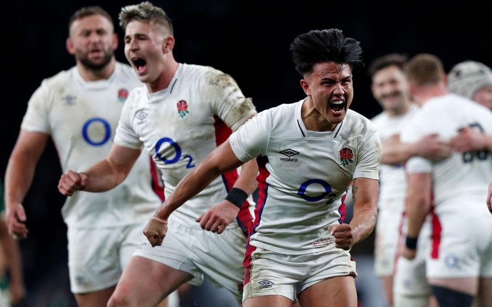 Marcus Smith (right) celebrates after England's win over South Africa at Twickenham last November - AFP