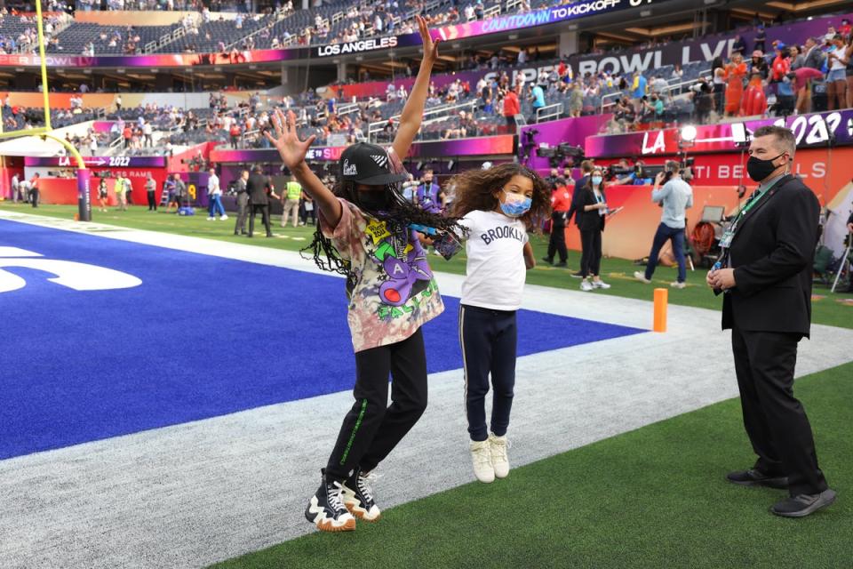 Blue Ivy, left, dances on the field before February’s Super Bowl kicks off (Getty Images)