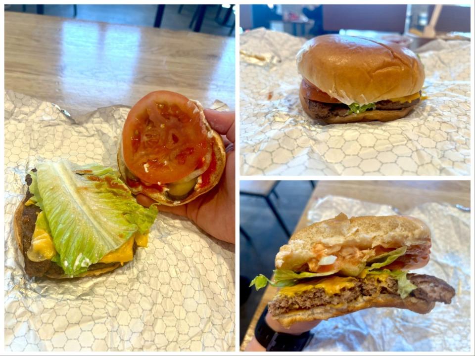 A burger with a slide of tomato, lettuce, pickles and cheese.