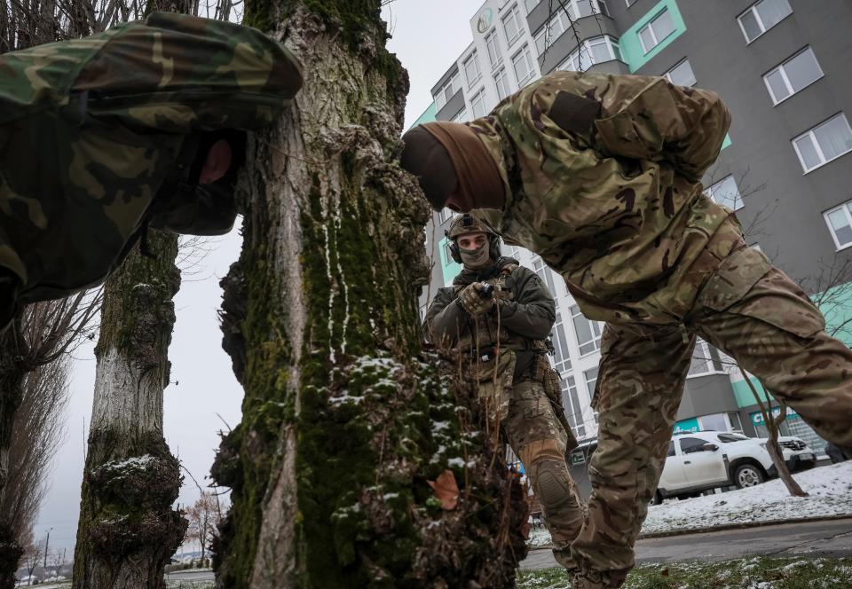 Ukrainian troops stage an interrogation during drills near Belarus (Reuters)