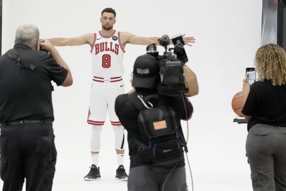 Chicago Bulls guard Zach LaVine poses for photographers during the NBA basketball team's media day, Monday, Oct. 2, 2023, in Chicago. (AP Photo/Charles Rex Arbogast)