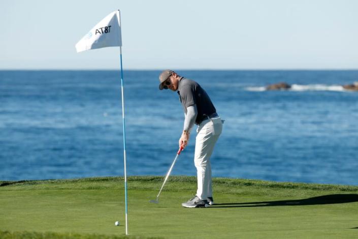 PEBBLE BEACH, CALIFORNIA - FEBRUARY 02: Boxer Canelo Alvarez putts on the seventh green during a practice round prior to the AT&amp;T Pebble Beach Pro-Am at Pebble Beach Golf Links on February 02, 2022 in Pebble Beach, California. (Photo by Cliff Hawkins/Getty Images)