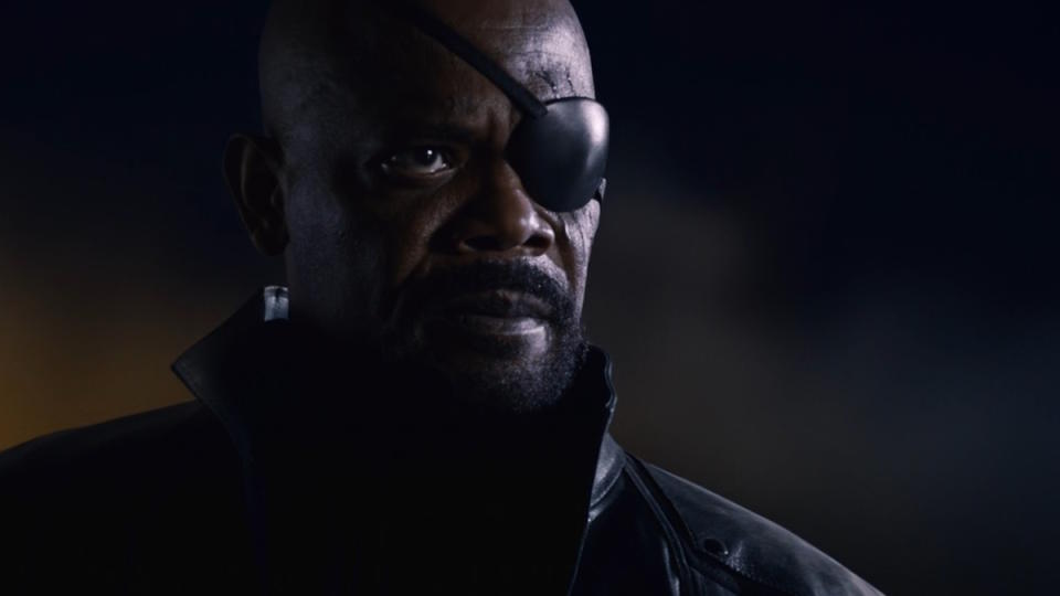 <p> When Samuel L. Jackson stepped out of the shadows in Tony Stark’s living room in the post-credits of Iron Man, no one knew just how much things were about to change. While Jackson’s involvement is mostly the result of negotiation between Marvel Comics and Jackson himself (long story, but it’s a good one), the Pulp Fiction star has masterfully seized this rare alignment of the stars to be one of the most enduring figures in the history of superhero movies. With multiple film and TV appearances under his belt, Nick Fury commands respect from everyone around him, even from aliens, all without having any powers of his own to speak of. He’s Nick Fury. He doesn’t <em>need</em> powers, he <em>is</em> power. </p>