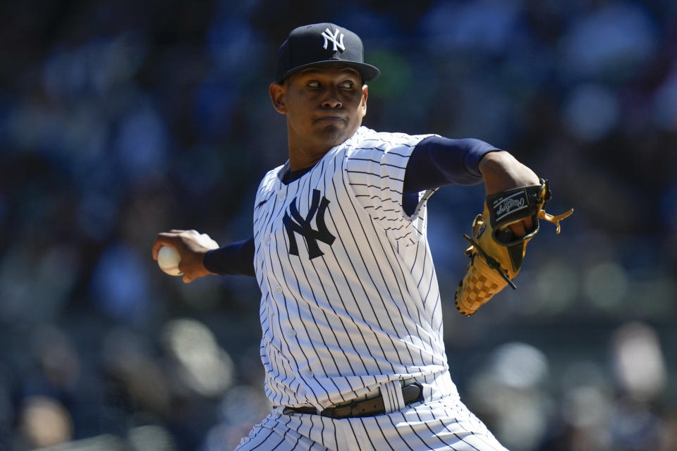 New York Yankees pitcher Jhony Brito throws during the first inning of the baseball game against the San Francisco Giants at Yankee Stadium, Sunday, April 2, 2023, in New York. (AP Photo/Seth Wenig)
