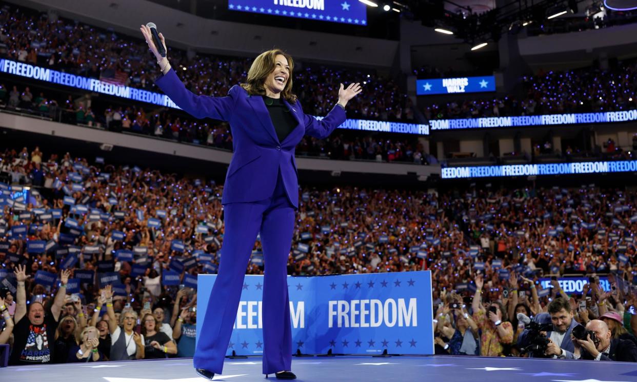 <span>Kamala Harris walks on stage at a campaign rally at the Fiserv Forum in Milwaukee, Wisconsin, on Tuesday.</span><span>Photograph: Anna Moneymaker/Getty Images</span>