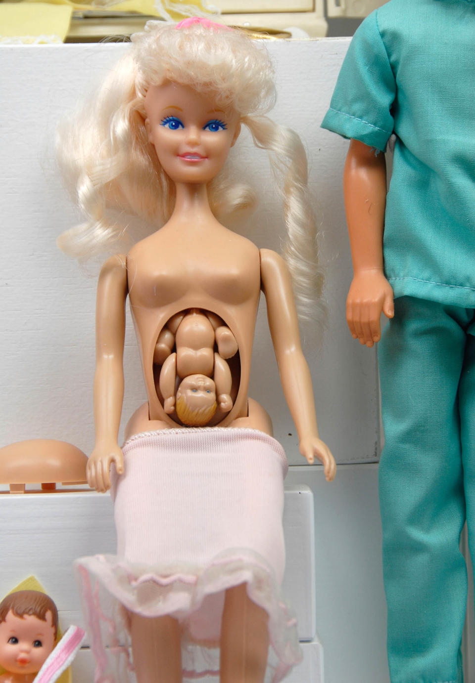 Pregnant Midge Barbie with a detachable bump containing a baby. (Alamy )
