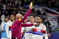 Soccer Football - Ligue 1 - Olympique Lyonnais vs Rennes - Groupama Stadium, Lyon, France - February 11, 2018 Lyon's Nabil Fekir is shown a yellow card by referee Amaury Delerue REUTERS/Emmanuel Foudrot