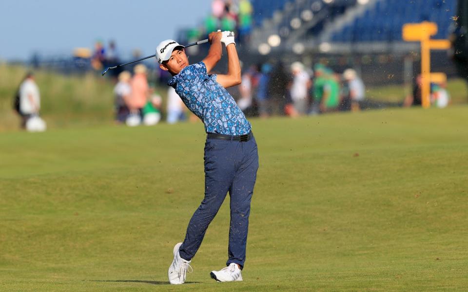 Collin Morikawa of United States plays his second shot on the 18th hole during Day Four of The 149th Open at Royal St Georgeâ€™s Golf Club on July 18, 2021 in Sandwich, - GETTY IMAGES
