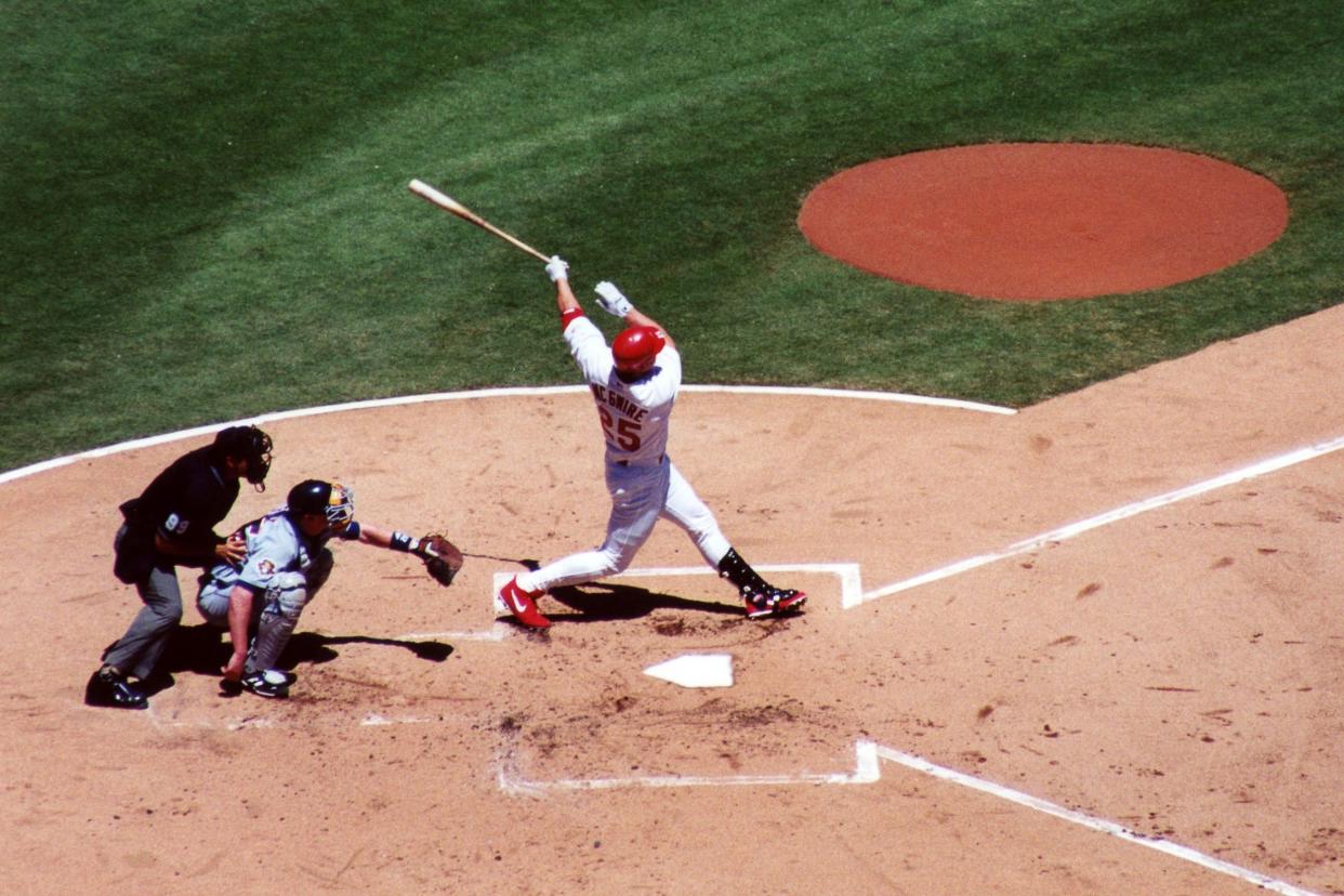 Mark McGwire playing baseball