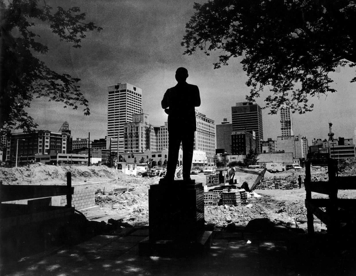 May 10, 1982: The statue of WC Handy is surrounded by the construction of a stage and seating area at Handy Park on Beale Street in Memphis. Barney Sellers / The Commercial Appeal