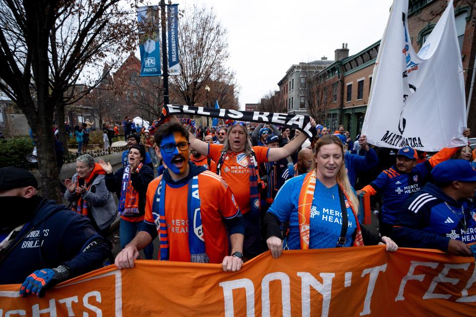 FC Cincinnati fans march to the stadium before the MLS Eastern Conference Final match between FC Cincinnati and Columbus Crew at TQL Stadium in Cincinnati on Saturday, Dec. 2, 2023.