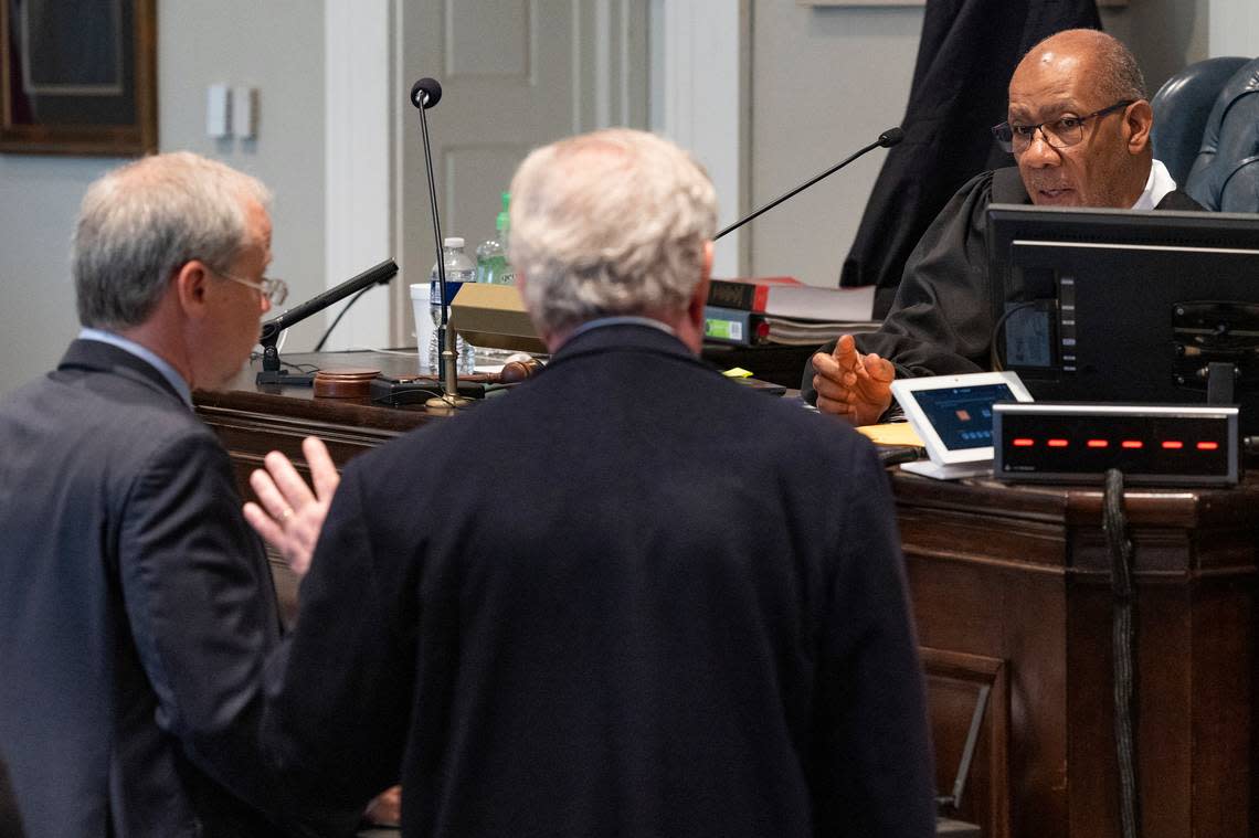 Creighton Waters for the state and Dick Harpootlian for the defense speak with Judge Clifton Newman as jury selection begins the in Alex Murdaugh murder trial at the Colleton County Courthouse in Walterboro, S.C. on Monday, Jan. 23, 2023.( Joshua Boucher/The State via AP, Pool)